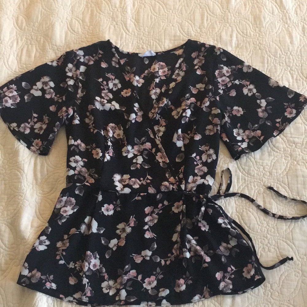 Black floral V-neck blouse...